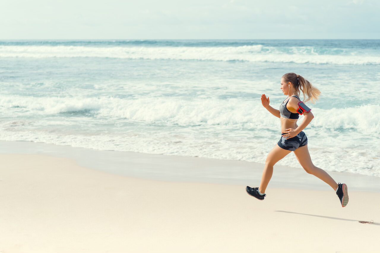 girl running on Maldives beach